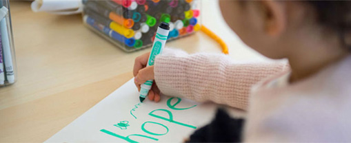 The Children's Room: Little girl coloring the word hope